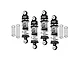 A set of four GPM Racing adjustable RC shock absorbers in silver and black, with four additional loose coil springs on a white background.