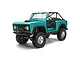 Turquoise blue Axial SCX10 III Early Ford Bronco RC rock crawler on a white background.