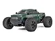 ARRMA Big Rock 223S 4WD RC monster truck in green, featuring large off-road tires and a detailed pickup truck body on a white background.