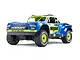 ARRMA Mojave Grom 1/16 scale RC short course truck in blue and white with neon yellow wheels and accents, shown from a front three-quarter angle.