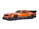 An orange ARRMA Felony 6S BLX 1/7 scale street basher RC car viewed from the side against a white background.