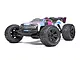 ARRMA Kraton 6S V6 BLX 1/8 scale RC truggy in a pink, blue, and white patterned livery, shown from a front three-quarter angle against a white background.