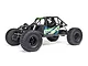 Axial AXP8 Gilamon 2.2 RC rock crawler in green, featuring a tube chassis, large off-road tires, and detailed driver figures.