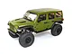 A green Axial SCX6 Jeep JLU Wrangler RC rock crawler viewed from a high angle against a white background.