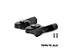 A pair of black GPM Racing aluminium rear wing mounts for RC cars, shown with two small mounting screws on a white background.