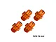 Four orange GPM Racing aluminium 17mm +5mm wheel hex adapters for RC cars, displayed on a white background.