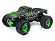 ARRMA Quake 223S BLX RC monster truck in green and black with aggressive tread tires and a detailed body shell.