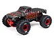 ARRMA Quake 223S BLX RC monster truck in red and grey camo livery, featuring large off-road tires and a bold Quake logo on the side.