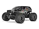 ARRMA GORGON 1/10 scale 2WD RC monster truck in gunmetal grey with aggressive off-road tires and custom graphics on a white background.