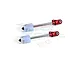 Two GPM Racing red aluminium and steel shock absorber shafts with white plastic spacers on a white background.
