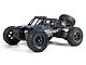 BlackZon Smyter DB 1/12 scale RC desert buggy in blue and black, featuring a roll cage, spare tire, and off-road tires.