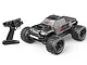 MJX Hyper Go 10208 1/10 scale RC monster truck in black with its matching pistol-grip radio transmitter on a white background.
