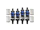 Four GPM Racing aluminium shock absorbers in blue and black, with two additional loose springs, displayed against a white background.