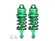 Two green GPM Racing aluminium adjustable RC shock absorbers with black springs and two white ball joint inserts on a white background.