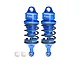 Two GPM Racing blue aluminium adjustable RC shock absorbers with black springs and two white plastic ball ends on a white background.