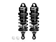 Two black GPM Racing aluminium adjustable RC shock absorbers with black springs and two small white plastic ball ends on a white background.