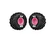 Two ARRMA dBoots Cut Chevron monster truck tyres mounted on bright pink plastic rims against a white background.