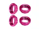 Four pink anodised aluminium shock collars with internal O-rings and ridged grip edges on a white background.