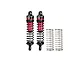 Two red and black aluminium RC shock absorbers with black springs and two spare springs against a white background.
