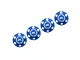 Four blue anodized aluminium wheel nuts with silver inlays and branding from GPM Racing arranged diagonally against a white background.