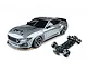 Grey MTRTR 275 RC drift car body with wide fenders alongside its bare black chassis on a white background.
