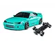 MST mint green S15RB remote control drift car body shell displayed next to its black RC chassis on a white background.