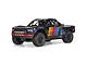 ARRMA MOJAVE 6S 1/7 scale 4WD RC short course truck in blue with colorful retro racing livery against a white background.