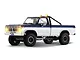 FMS FCX18 II Ford F-100 1/18 scale RC rock crawler truck in blue and white with lit headlights and roll bar.