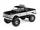Axial SCX24 1967/72 Chevrolet C10 RC Rock Crawler in black and white finish, studio shot against a white background.