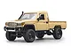 Yellow MN Model Toyota LC79 RC rock crawler electric 4WD truck viewed from the front right against a plain white background.