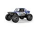 Studio product shot of a blue Maverick Scout24 Flux 1/24 scale RC rock crawler with large knobby tires and roll cage.