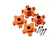 Four orange anodized aluminium wheel hex adapters with metal pins on a clean white background.
