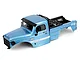 Blue RGT 1/10 Challenger Pro painted RC body shell with black accessories and white side decals against a white background.