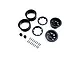 Axial 1/10 1.9 KMC Grenade black beadlock wheel components including rims, rings, caps, and hardware neatly laid out on a white background.