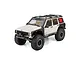 Studio product photo of the white Axial SCX10 III Jeep Cherokee XJ 1/10 scale 4WD electric RC rock crawler.