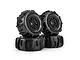 Four Pro-Line Dumont paddle tyres mounted on black split-six rims against a white background.