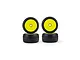 Four Pro-Line RC car wheels with black treaded tyres mounted on bright yellow dish rims against a white background.