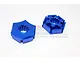 Two blue anodized aluminium claw-style wheel hex adapters for RC cars, shown from top and side angles against a white background.