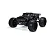 Studio shot of the ARRMA Notorious 6S BLX 1/8 scale RC stunt truck in black, featuring a classic truck body style, large off-road tires, and rear wing.