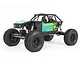 Axial Capra 1.9 Unlimited Trail Truck RC rock crawler in green, featuring a tube chassis, large off-road tires, and detailed driver figures.