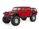 A red Axial SCX10 III Jeep JT Gladiator RC rock crawler truck viewed from a three-quarter angle against a white background.