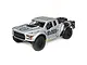 Losi Baja Rey Ford Raptor RC truck in silver with Black Rhino branding, featuring off-road tires and a spare wheel mounted on the rear.