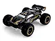 BlackZon Slyder ST 1/16 scale RC stadium truck in black and gold livery, featuring off-road tires and a rear spoiler, isolated on a white background.