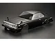 A black 1/10 scale RC car body shell of a 1980 Nissan Skyline Hardtop 2000 Turbo GT-ES, shown from a high-angle front three-quarter view.