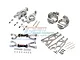 A collection of grey aluminium suspension and drive train upgrade parts for an RC car, including arms, knuckles, and hardware, laid out on a white background.