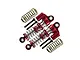 Two red GPM Racing aluminium piggyback shocks for RC cars, with spare springs and mounting screws on a white background.
