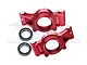 A pair of red anodized aluminium oversized rear hubs for RC cars by GPM Racing, shown with two metal ball bearings.