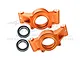 Two orange anodized aluminium RC rear hubs with GPM branding and two metal ball bearings on a white background.