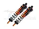 Two GPM Racing orange and black aluminium piggyback RC shock absorbers with black springs against a white background.