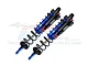 A pair of GPM Racing blue and black aluminium piggyback RC shock absorbers with black springs against a white background.